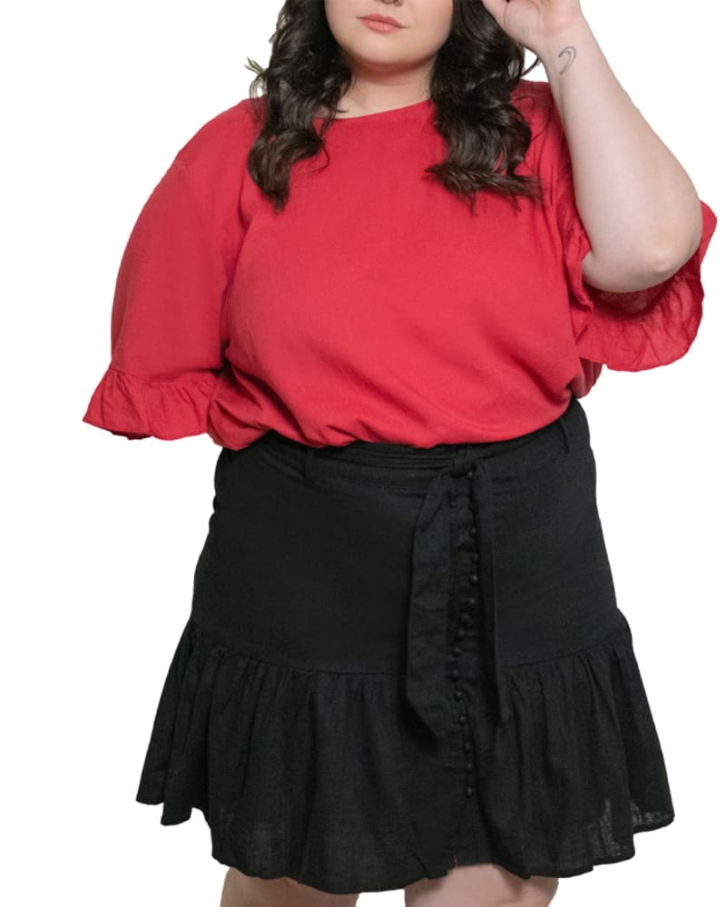Front of a model wearing a size XL Jasmine Skirt High Waisted Belted Solid Black in Black by ANNICK. | dia_product_style_image_id:282070